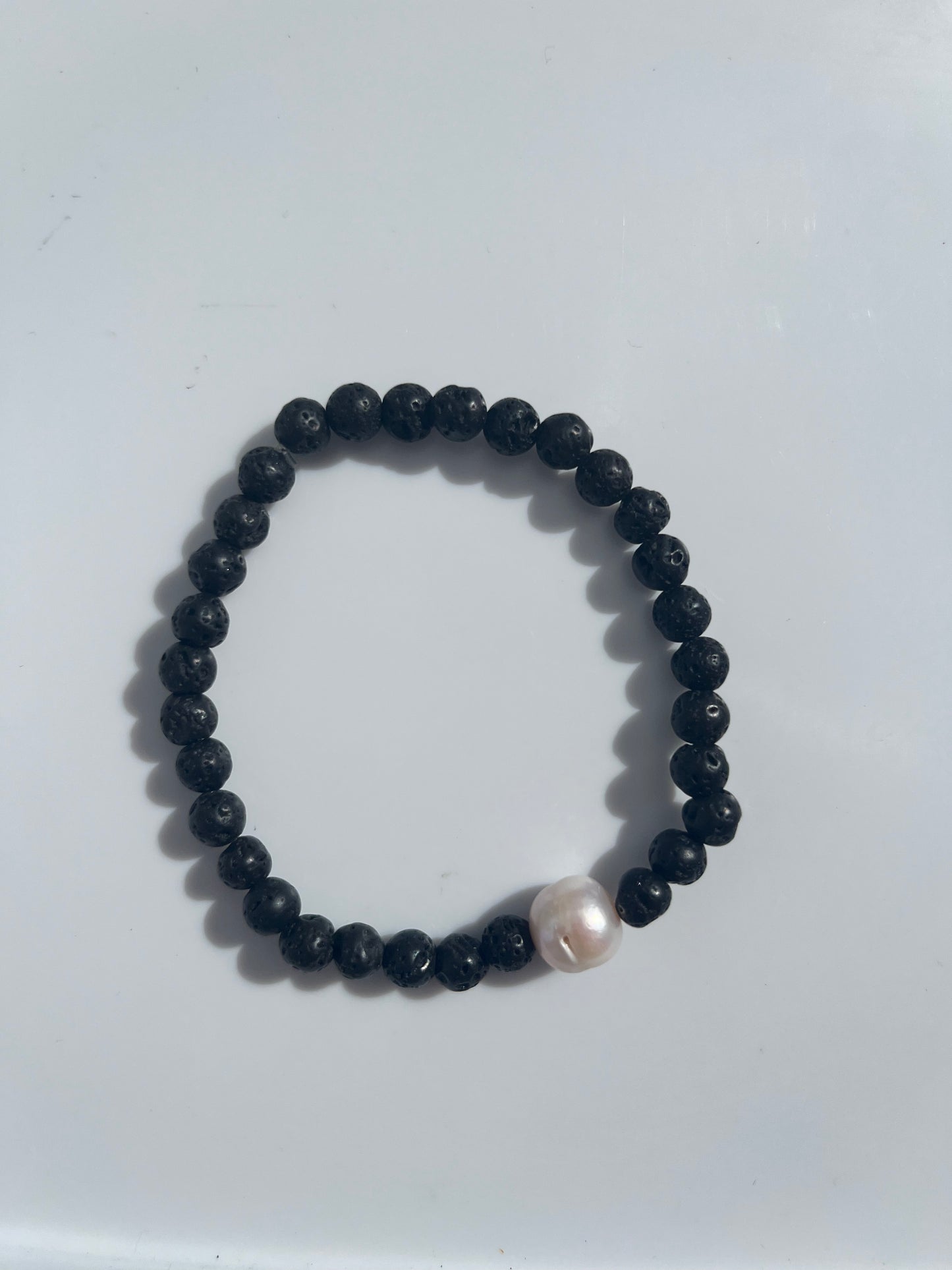 1 White Edison Pearl with small faux lava rock