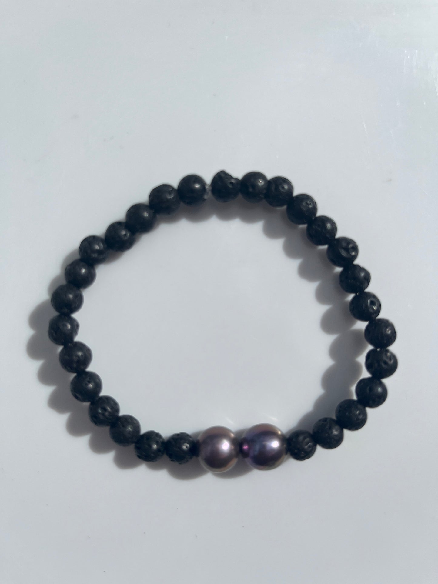 2 purple edison pearls with small faux lava rocks